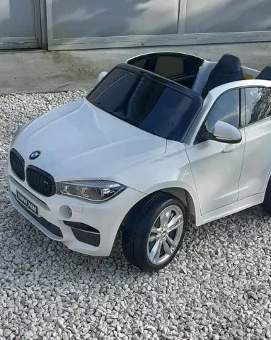 Džip BMW X6M dvosed na akumulator 2X120W sa kožnim sedištem i mekim gumama – beli - 0